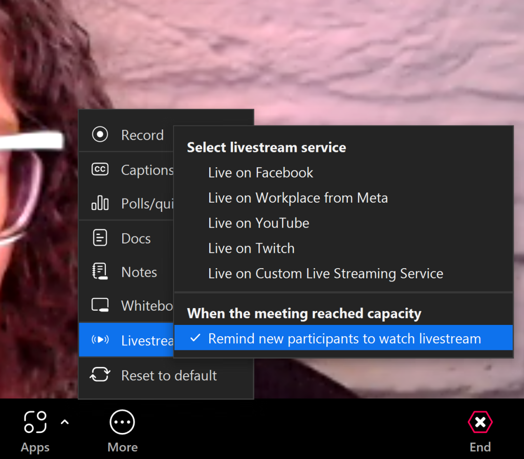 This screenshot of a Zoom meeting shows the various options that exist to support livestreaming, including streaming directly to Twitch, YouTube and a Facebook Page. You must use the "Custom Streaming Service" option to livestream to a Facebook Group.